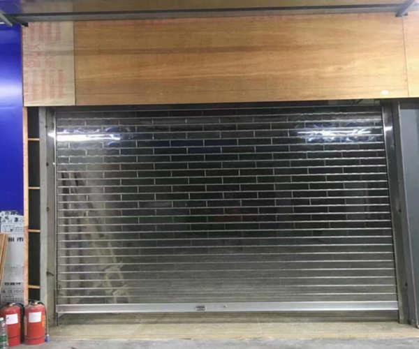 卷帘门-电动水晶门订做-加工热线-天津市东丽区新瑞铁艺卷帘门加工厂